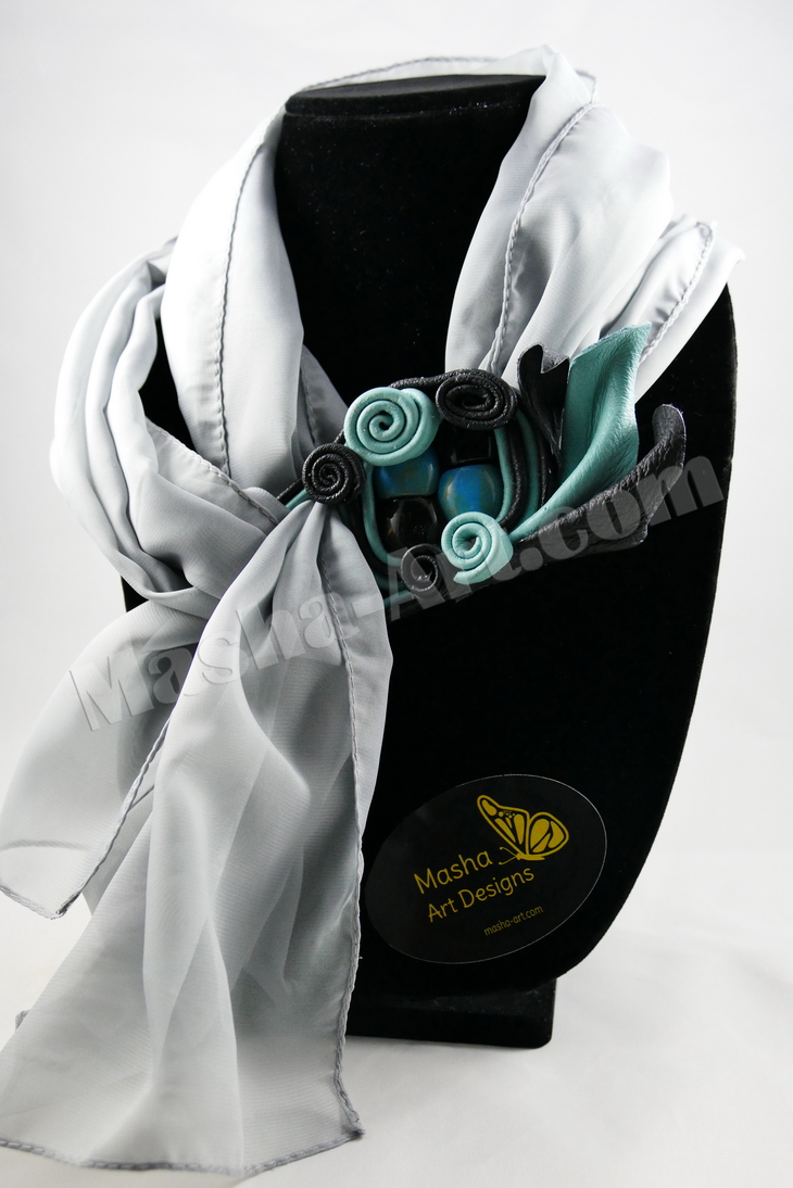 Masha creating leather jewelry